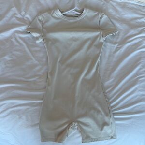 Women's Cream Short-Sleeve Footie Bodysuit
